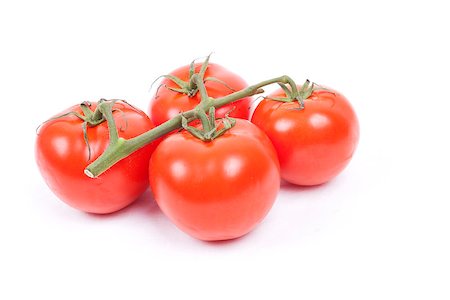tomatos on a vine isolated on a white background Foto de stock - Super Valor sin royalties y Suscripción, Código: 400-07251646