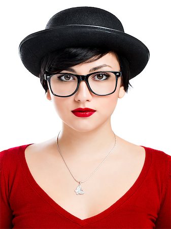 funny looking girls with glasses - Beautiful girl wearing a hat and nerd glasses, isolated over white background Stock Photo - Budget Royalty-Free & Subscription, Code: 400-07252307