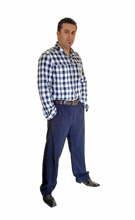 simsearch:400-06795988,k - A young tall man standing for white background very relaxed with his hands in his pocket. Foto de stock - Super Valor sin royalties y Suscripción, Código: 400-07252753