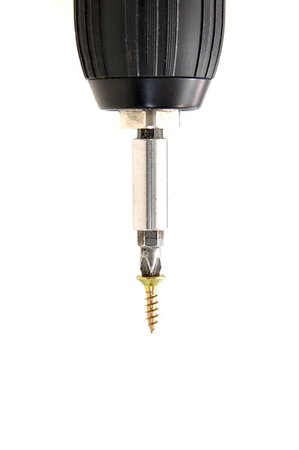 simsearch:640-02950999,k - Screwing the screw using a power drill on a white background Photographie de stock - Aubaine LD & Abonnement, Code: 400-07252789