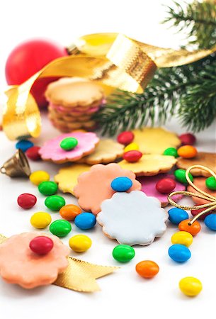 Colorful Christmas cookies and candies with holiday decorations around Stock Photo - Budget Royalty-Free & Subscription, Code: 400-07252950