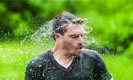 Young Adult Completely Drenched Shaking His head and Making a Funny Face Photographie de stock - Aubaine LD & Abonnement, Code: 400-07253214