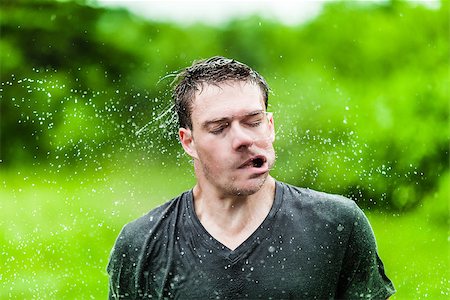 Young Adult Completely Drenched Shaking His head and Making a Funny Face Photographie de stock - Aubaine LD & Abonnement, Code: 400-07253212