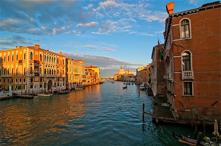 simsearch:400-07272498,k - Venice Italy grand canal view from the top of Accademia bridge with "Madonna della Salute" church on background at sunset Stock Photo - Budget Royalty-Free & Subscription, Code: 400-07264554