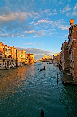 simsearch:400-07272498,k - Venice Italy grand canal view from the top of Accademia bridge with "Madonna della Salute" church on background at sunset Stock Photo - Budget Royalty-Free & Subscription, Code: 400-07264555