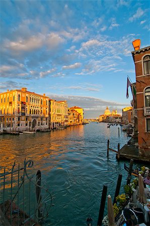 simsearch:400-07272498,k - Venice Italy grand canal view from the top of Accademia bridge with "Madonna della Salute" church on background at sunset Stock Photo - Budget Royalty-Free & Subscription, Code: 400-07264553