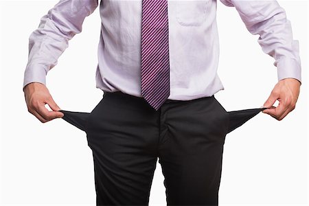 simsearch:400-07305634,k - Mid section of a businessman with pockets pulled out over white background Photographie de stock - Aubaine LD & Abonnement, Code: 400-07266989