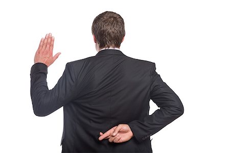 simsearch:400-07274414,k - Rear view of a businessman with crossed fingers and stop gesture over white background Photographie de stock - Aubaine LD & Abonnement, Code: 400-07266992