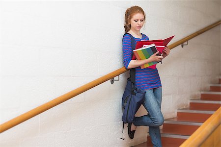 simsearch:400-07267769,k - Redhead student reading notes on the stairs at the university Stock Photo - Budget Royalty-Free & Subscription, Code: 400-07267694