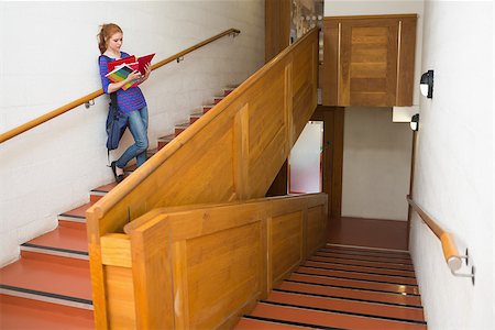 simsearch:400-07267769,k - Student reading her notes on the stairs at the university Stock Photo - Budget Royalty-Free & Subscription, Code: 400-07267703