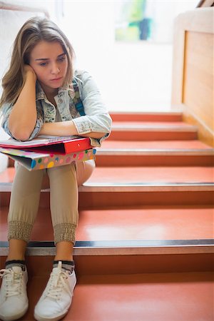 simsearch:400-07267769,k - Troubled student sitting on stairs in college Stock Photo - Budget Royalty-Free & Subscription, Code: 400-07267761