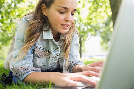 student college laptop lying grass - Young happy student lying on the grass using laptop on college campus Stock Photo - Budget Royalty-Free & Subscription, Code: 400-07267879