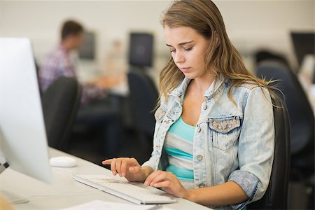 simsearch:400-07267978,k - Focused student studying in the computer room in college Stock Photo - Budget Royalty-Free & Subscription, Code: 400-07267953