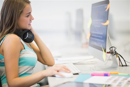 simsearch:400-07267978,k - Pretty young student working in the computer room in college Stock Photo - Budget Royalty-Free & Subscription, Code: 400-07267989