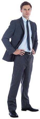 serious hip businessman - Serious businessman with hands on hips on white background Stock Photo - Budget Royalty-Free & Subscription, Code: 400-07268060
