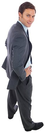 simsearch:400-06885881,k - Cheerful businessman standing with hands on hips on white background Photographie de stock - Aubaine LD & Abonnement, Code: 400-07268111