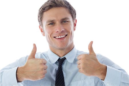 simsearch:400-07664375,k - Businessman showing thumbs up on white background Foto de stock - Royalty-Free Super Valor e Assinatura, Número: 400-07268253