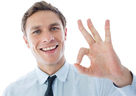 simsearch:400-07664375,k - Businessman showing ok sign on white background Foto de stock - Royalty-Free Super Valor e Assinatura, Número: 400-07268265