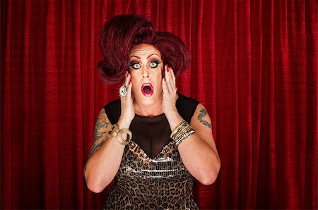 simsearch:400-07261849,k - Amazed drag queen with tattoos in theater Fotografie stock - Microstock e Abbonamento, Codice: 400-07261814