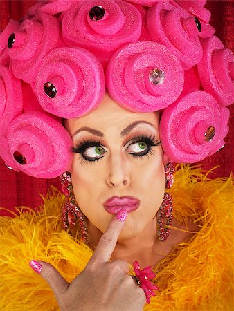 simsearch:400-07261849,k - Fancy drag queen with finger on lips Fotografie stock - Microstock e Abbonamento, Codice: 400-07261845