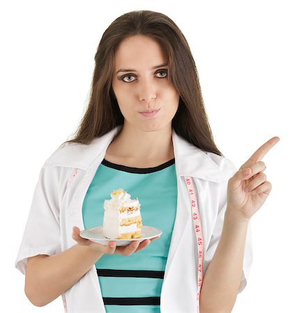 empfehlen - Woman nutritionist saying “no” to cake, isolated on white background. Stockbilder - Microstock & Abonnement, Bildnummer: 400-07261962
