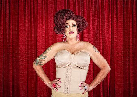 Drag queen in corset with hands on hips Stock Photo - Budget Royalty-Free & Subscription, Code: 400-07262304