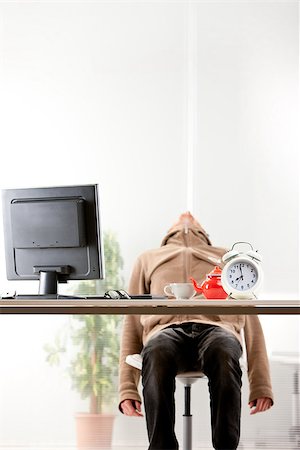 snore - young employee sleeping on his chair instead of working Stock Photo - Budget Royalty-Free & Subscription, Code: 400-07263203