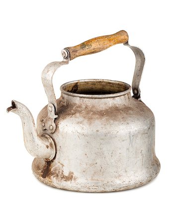 Old aluminum kettle with wooden handle isolated on white background Photographie de stock - Aubaine LD & Abonnement, Code: 400-07263691