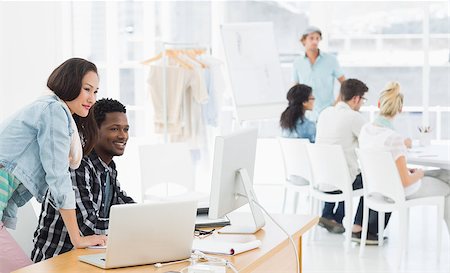 Group of casual artists working at desks in the creative office Stock Photo - Budget Royalty-Free & Subscription, Code: 400-07274049