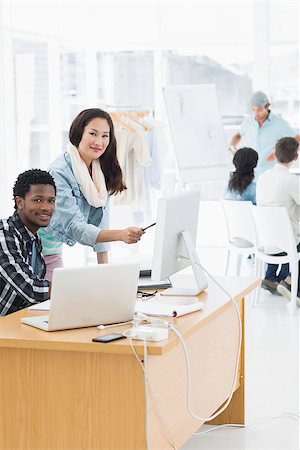 Group of casual artists working at desks in the creative office Stock Photo - Budget Royalty-Free & Subscription, Code: 400-07274051