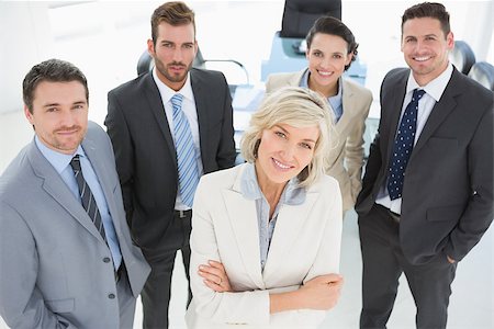 simsearch:400-07274414,k - Portrait of a confident business team standing in a bright office Photographie de stock - Aubaine LD & Abonnement, Code: 400-07274548