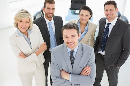 simsearch:400-07274414,k - Portrait of a confident business team standing in a bright office Photographie de stock - Aubaine LD & Abonnement, Code: 400-07274549