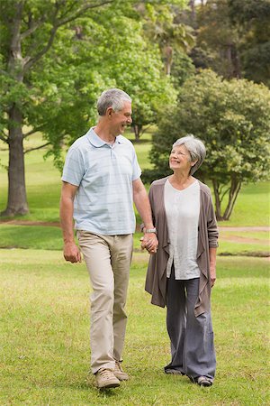 simsearch:400-07274981,k - Full length of a happy senior couple holding hands and walking in the park Stock Photo - Budget Royalty-Free & Subscription, Code: 400-07274936