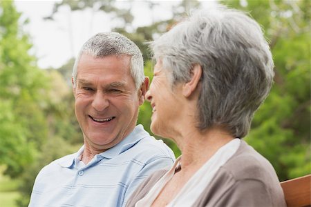 simsearch:400-07274981,k - Closeup of a happy senior man and woman looking at each other at the park Stock Photo - Budget Royalty-Free & Subscription, Code: 400-07274933