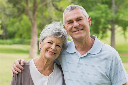 simsearch:400-07274981,k - Portrait of a senior woman and man with arms around at the park Stock Photo - Budget Royalty-Free & Subscription, Code: 400-07274961