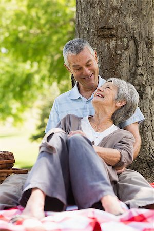 simsearch:400-07274981,k - Happy relaxed senior woman and man sitting at the park Stock Photo - Budget Royalty-Free & Subscription, Code: 400-07275053