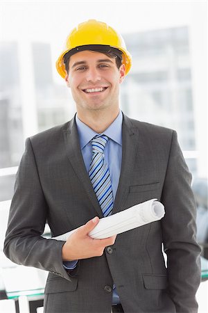 simsearch:400-07275251,k - Happy architect smiling at camera in the office Stock Photo - Budget Royalty-Free & Subscription, Code: 400-07275258