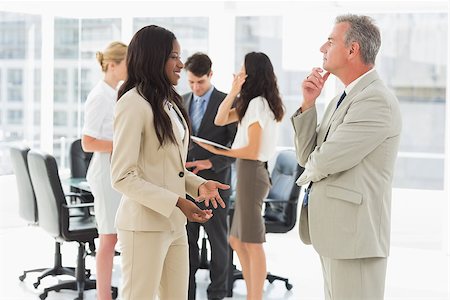 simsearch:400-07275394,k - Business people meeting and talking together in the office Stock Photo - Budget Royalty-Free & Subscription, Code: 400-07275297