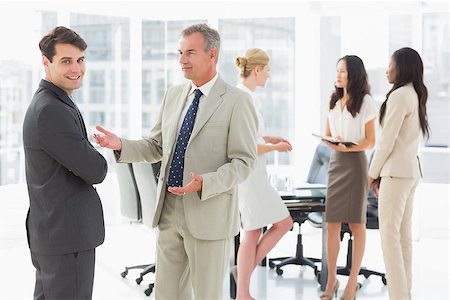 simsearch:400-07275394,k - Business people talking together in conference room in the office Stock Photo - Budget Royalty-Free & Subscription, Code: 400-07275299