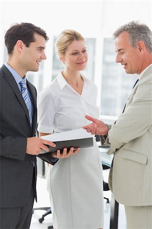 simsearch:400-06879270,k - Smiling business colleagues talking together in the office Stock Photo - Budget Royalty-Free & Subscription, Code: 400-07275320