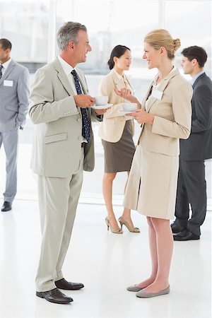 simsearch:400-07275394,k - Business people chatting and having coffee at a conference in the office Stock Photo - Budget Royalty-Free & Subscription, Code: 400-07275380