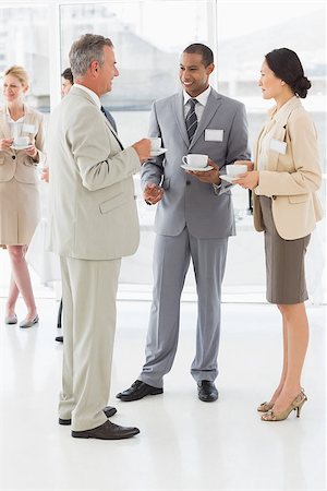 simsearch:400-07275394,k - Business people talking and drinking coffee at a conference in the office Stock Photo - Budget Royalty-Free & Subscription, Code: 400-07275382