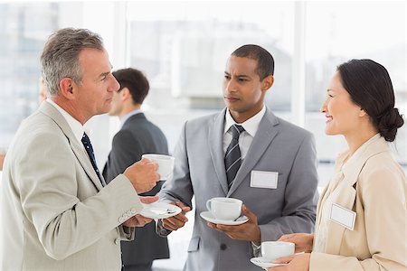 simsearch:400-07275394,k - Business people talking and having coffee at a conference in the office Stock Photo - Budget Royalty-Free & Subscription, Code: 400-07275383