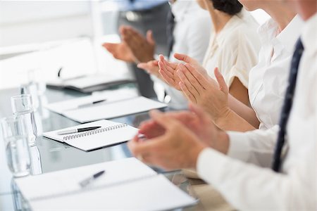 executives applauding - Business people clapping at a meeting in the office Stock Photo - Budget Royalty-Free & Subscription, Code: 400-07275397