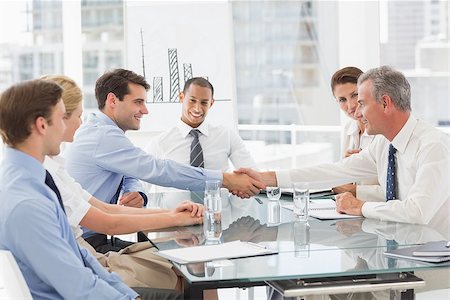 simsearch:400-07275394,k - Business people making a deal at a meeting in the office Stock Photo - Budget Royalty-Free & Subscription, Code: 400-07275417