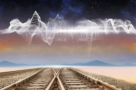 railway track in desert images - Train tracks under energy wave in desert Foto de stock - Super Valor sin royalties y Suscripción, Código: 400-07277220