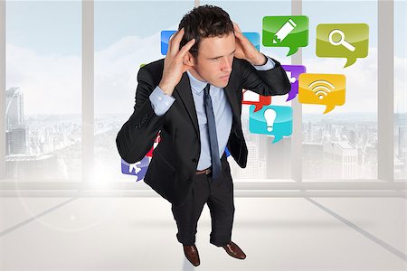 simsearch:400-07277726,k - Stressed businessman with hands on head against arrows in the sky in orange Stock Photo - Budget Royalty-Free & Subscription, Code: 400-07277469