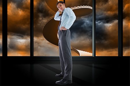 person on winding stairs - Thinking businessman with hand on head against winding staircase in orange sky Stock Photo - Budget Royalty-Free & Subscription, Code: 400-07277570