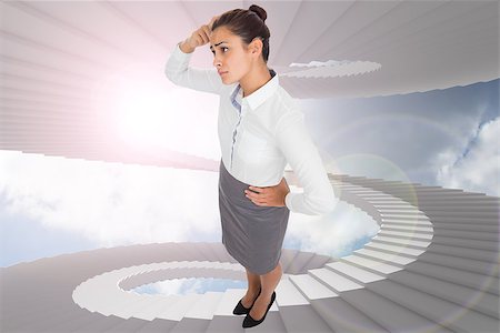 person on winding stairs - Worried businesswoman against winding staircase in the sky Stock Photo - Budget Royalty-Free & Subscription, Code: 400-07277782