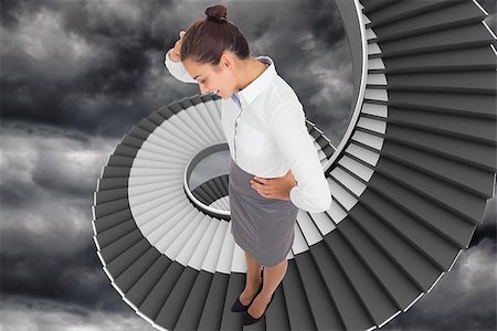 person on winding stairs - Smiling thoughtful businesswoman against winding staircase in the sky Stock Photo - Budget Royalty-Free & Subscription, Code: 400-07277808